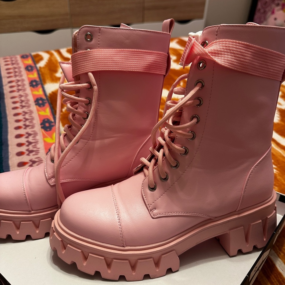 Pink lace up boots
